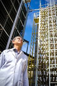 A person in a white coat outside of a building

AI-generated content may be incorrect.